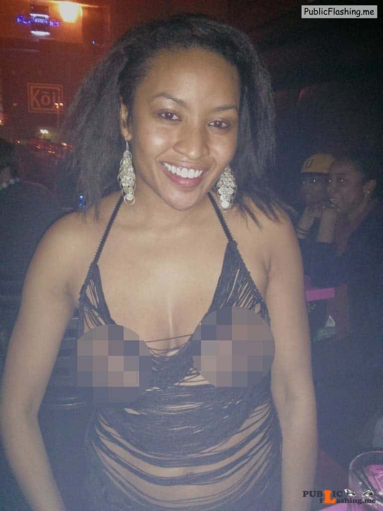 Big black tits in public