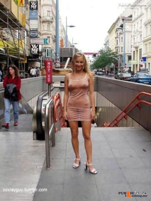 Public flashing photo carelessnaked: Almost nude in a transparent dress in a public... Public Flashing