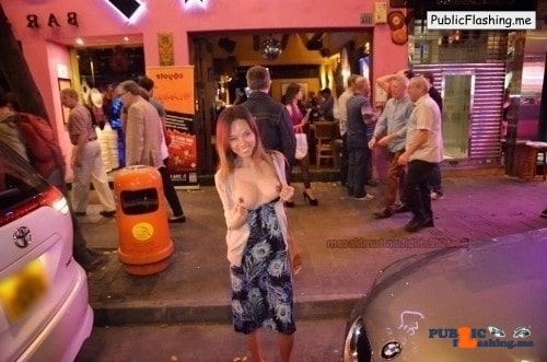 Public Flashing Pictures Boobs pics Boobs Asian pics Asian Amateur pics Amateur : Asian hottie is flashing her big fake boobs in front of some night bar. While there are a lot of people on the street she is sharing her round titties and smiling to her her BF. Round tits with brown...