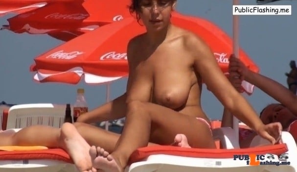 Big natural boobs topless on beach voyeur VIDEO