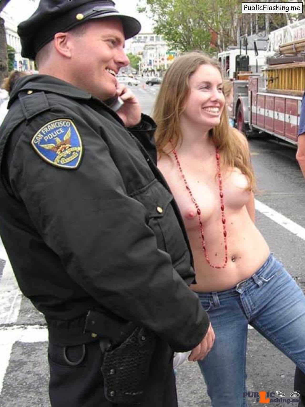 Public Flashing Pictures College pics College Boobs pics Boobs Amateur pics Amateur : Photo of topless blonde girl and a police officer on the streets of San Francisco. Some cop would arrest this girl immediately but this one obviously was charmed with this natural babe and her  boobies. Big smile on girl’s face is...