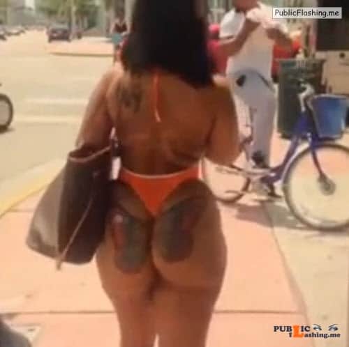 Big black ass with butterfly tattoo on the street VIDEO Public Flashing