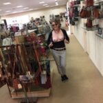 Flashing pussy in public store and smiling to camera