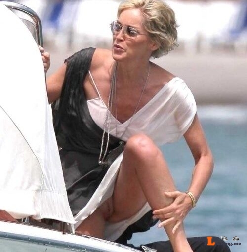Exposed in public Sharon Stone flashing pussy…