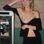 Domino lady topless with strap-on street walk