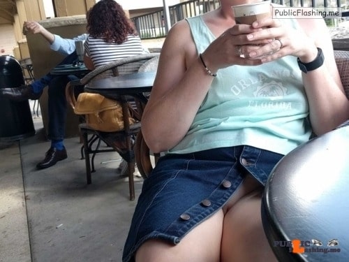 Exposed in public just-my-wife-and-nothing-else: Sitting by the door of a coffee…