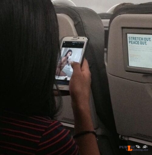 Exposed in public Caught looking at porn on a plane…